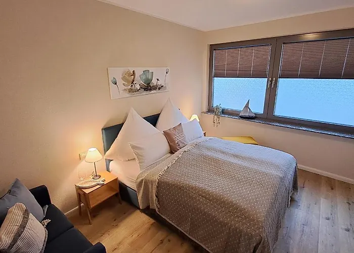 Отель Hotel-ferienwohnungen Cafe Maarblick Шалькенмерен