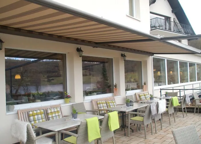 Отель Hotel-ferienwohnungen Cafe Maarblick 3*