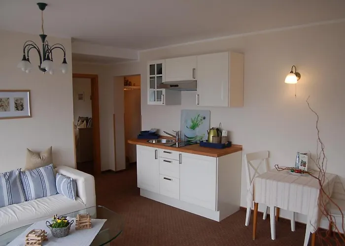 Отель Hotel-ferienwohnungen Cafe Maarblick